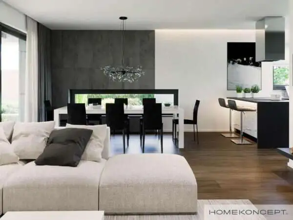 Gotowy projekt wnętrza domu homekoncept 43 - aranżacja salonu z dużą sofą.