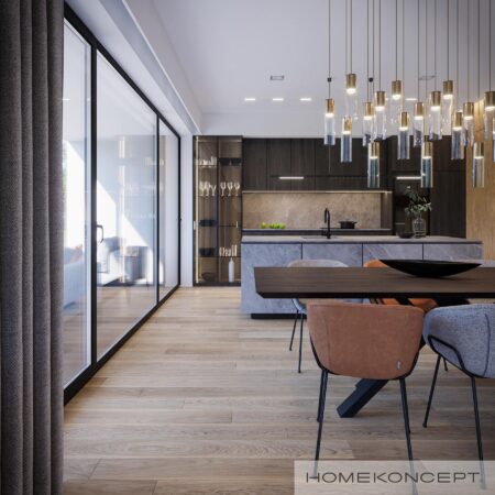 Kuchnia z wyspą ze spieku – duże okno tarasowe – projekt domu HOMEKONCEPT 79