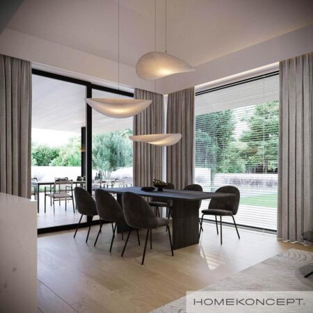 Projekt domu parterowego homekoncept 108 - widok efektownego oświetlenia nad stołem jadalnianym.