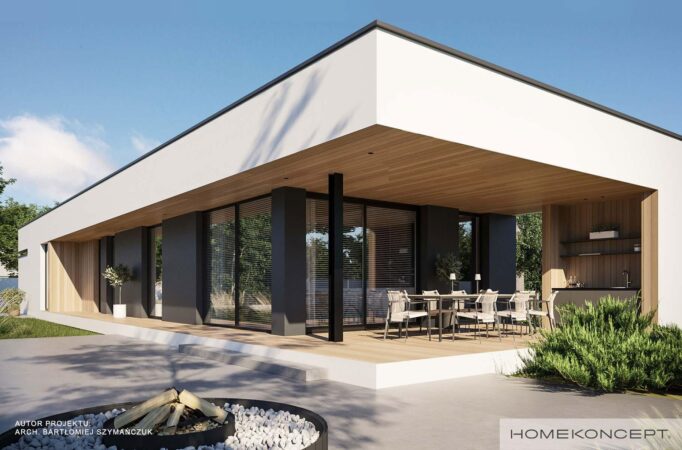 Projekt domu parterowego homekoncept 106 - widok na taras z kuchnią zewnętrzną.
