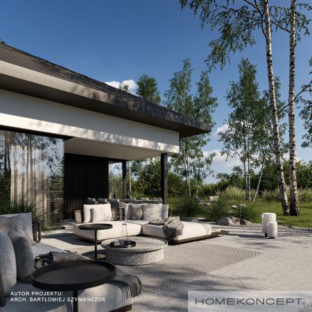 Projekty domów 130m2 homekoncept 133 - widok na duże okno narożne w strefie dziennej.