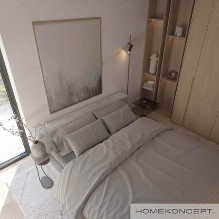 Projekt domu parterowego z garażem homekoncept 122 g1 - widok na komfortowe łóżko w sypialni.